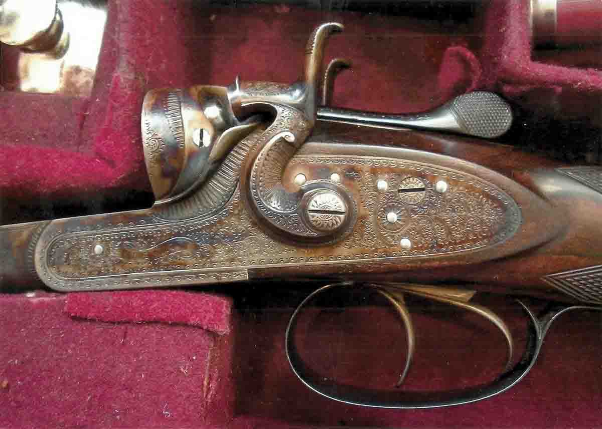 A view of the engraved side lock.